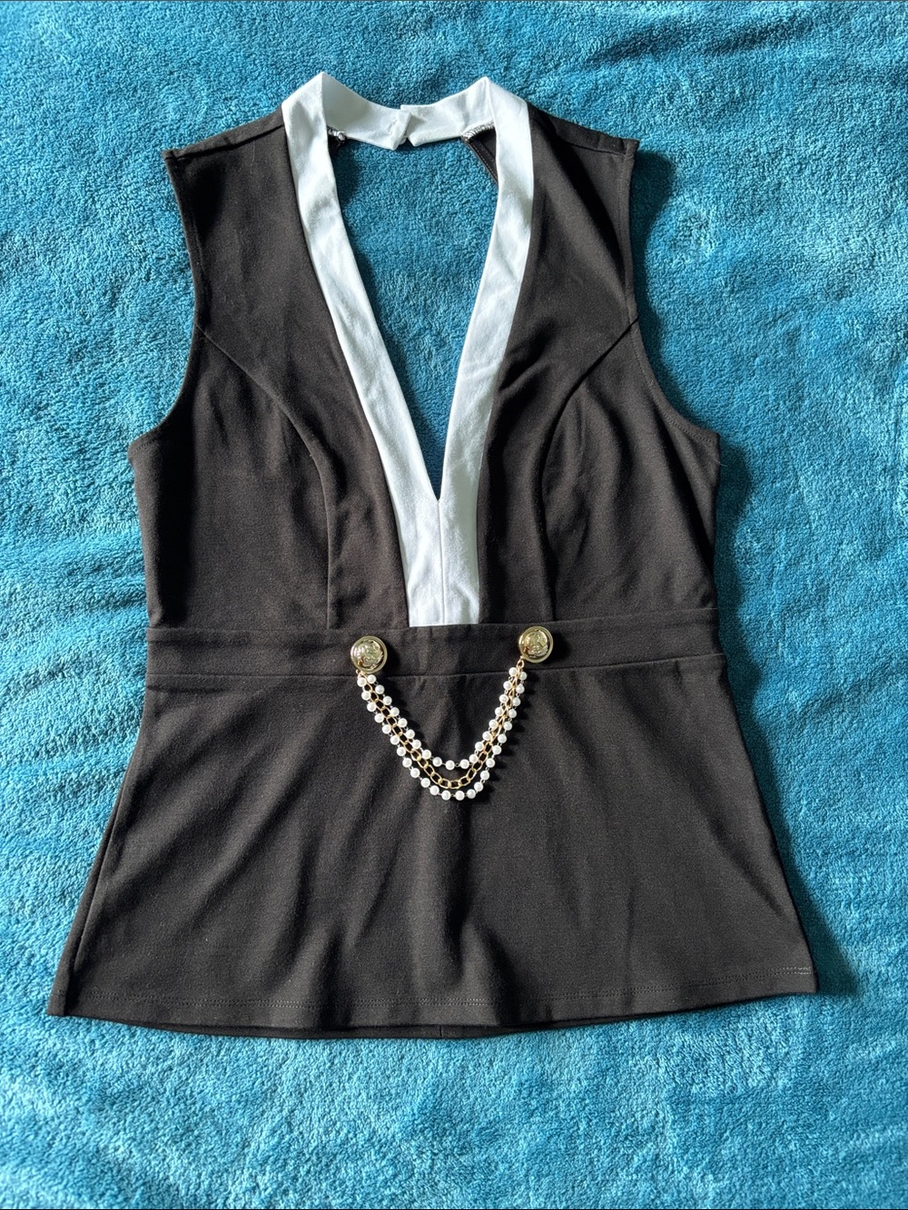 VENUS Black Sleeveless V-Neck Peplum Top with White Trim and Decorative Chain